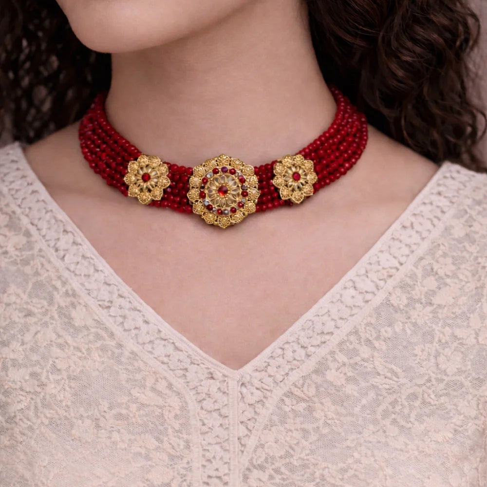 Red beaded choker with gold accents 