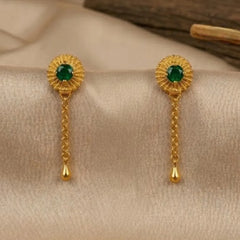 Gold earrings with green gemstones 